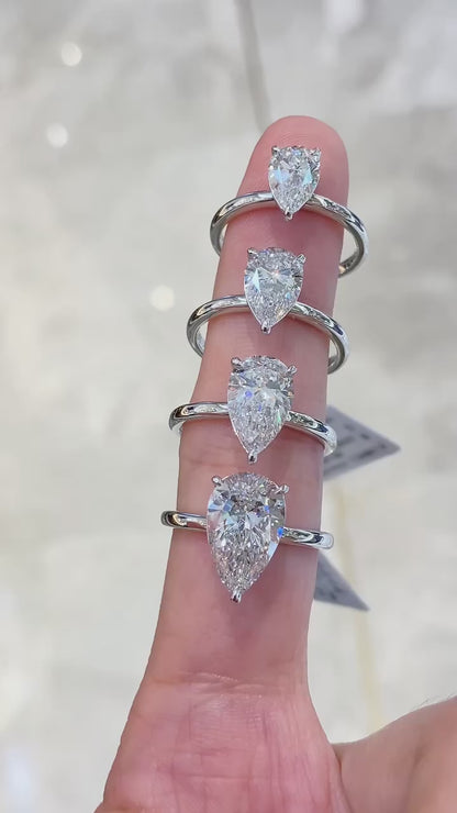 Solitaire Three Prong Pear Diamond Ring
